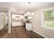 Kitchen with stainless steel appliances, granite countertops, and new hardwood floors at 310 Oak Se Dr, Atlanta, GA 30354