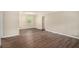 Living room with hardwood flooring and a view into dining area at 310 Oak Se Dr, Atlanta, GA 30354
