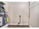 Clean utility room with dark wood flooring and an electric water heater at 310 Oak Se Dr, Atlanta, GA 30354