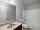 Bathroom featuring a shower, vanity, and a large mirror at 415 Village Way, Woodstock, GA 30188