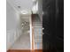 Inviting foyer featuring hardwood flooring, staircase, white wainscoting and an open floor plan at 415 Village Way, Woodstock, GA 30188