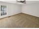 Bedroom with ceiling fan, exterior door, and neutral carpet at 4357 Treeline Way, Douglasville, GA 30135