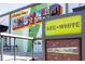 Vibrant 'Greetings From West End' mural art enhances the community's appeal with colorful graphics at 1481 Almont Sw Dr, Atlanta, GA 30310