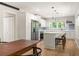 Modern kitchen featuring white cabinets, stainless steel appliances, and a kitchen island at 1481 Almont Sw Dr, Atlanta, GA 30310
