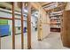 Unfinished basement area with exposed ceiling and some drywalling in place at 1488 Rivermist Sw Dr, Lilburn, GA 30047