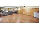 Spacious basement with wood-panelled walls and laminate flooring, ideal for entertainment at 1488 Rivermist Sw Dr, Lilburn, GA 30047