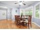 Cozy breakfast nook with a round table, seating for six, and natural light at 1488 Rivermist Sw Dr, Lilburn, GA 30047