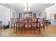 Elegant dining room with hardwood floors and plenty of room for entertaining at 1488 Rivermist Sw Dr, Lilburn, GA 30047