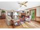 Cozy living room features hardwood floors, fireplace, and natural light at 1488 Rivermist Sw Dr, Lilburn, GA 30047