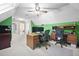 Spacious office space with dual desks, comfortable seating, and ample natural light at 1488 Rivermist Sw Dr, Lilburn, GA 30047