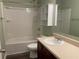 Bathroom featuring a sink vanity, a shower, and a medicine cabinet, ensuring comfort and convenience at 158 Grove Meadow Dr, Acworth, GA 30101