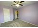 Bedroom featuring a ceiling fan and an open door to another room at 158 Grove Meadow Dr, Acworth, GA 30101