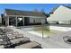 Community pool with plenty of lounge seating, offering a refreshing amenity at 158 Grove Meadow Dr, Acworth, GA 30101