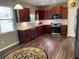 Charming kitchen with stainless steel appliances, granite countertops and ample cabinet space at 158 Grove Meadow Dr, Acworth, GA 30101