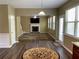 Inviting living room with an open floor plan, stone fireplace, and ample natural light at 158 Grove Meadow Dr, Acworth, GA 30101