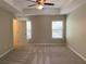 A bright, carpeted main bedroom with lots of space and natural light at 158 Grove Meadow Dr, Acworth, GA 30101