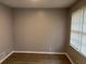Bedroom featuring hardwood floors and neutral paint, ready for personalization at 2858 Davidson Dr, Lithonia, GA 30058