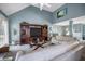 Spacious living room with high ceilings, large entertainment center, and comfortable seating at 31 Churchill Downs Ne, Cartersville, GA 30121