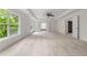 Large, bright bedroom features ceiling fan and many windows at 5484 Stone Cove Sw Dr, Atlanta, GA 30331