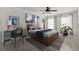 Modern bedroom with stylish furnishings, work space, and ample natural light at 5484 Stone Cove Sw Dr, Atlanta, GA 30331