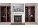 Cozy living room featuring a fireplace and built-in bookshelves, perfect for relaxing and entertaining at 5484 Stone Cove Sw Dr, Atlanta, GA 30331