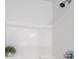 Modern shower stall featuring sleek fixtures and clean, white tiling at 5484 Stone Cove Sw Dr, Atlanta, GA 30331