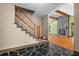 Open entryway featuring hardwood floors and staircase at 7320 Oak Arms Dr, Villa Rica, GA 30180