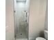 Bathroom with glass shower and gray tiled floors at 1021 Liberty Springs Dr, Woodstock, GA 30188