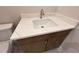 Bathroom vanity with solid surface counters and modern sink at 1021 Liberty Springs Dr, Woodstock, GA 30188