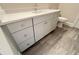 Bathroom vanity with white countertop, ample storage, and stylish fixtures at 1021 Liberty Springs Dr, Woodstock, GA 30188