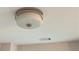 Close-up of a modern flush mount ceiling light fixture at 1021 Liberty Springs Dr, Woodstock, GA 30188