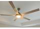 Stylish ceiling fan with integrated lighting enhances the room's comfort and aesthetic appeal at 1021 Liberty Springs Dr, Woodstock, GA 30188