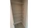Linen closet featuring adjustable wire shelving, and modern baseboards at 1021 Liberty Springs Dr, Woodstock, GA 30188