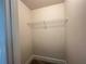 Walk-in closet features a shelf and plenty of storage at 1021 Liberty Springs Dr, Woodstock, GA 30188