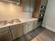 Kitchen boasting stainless steel appliances, granite countertops, and modern cabinetry at 1021 Liberty Springs Dr, Woodstock, GA 30188