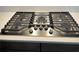 Gourmet kitchen cooktop with five burners, stainless steel finish, and modern design at 1021 Liberty Springs Dr, Woodstock, GA 30188