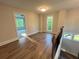 Second story landing with hardwood floors and natural light at 1021 Liberty Springs Dr, Woodstock, GA 30188