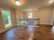 Second story landing with hardwood floors and natural light at 1021 Liberty Springs Dr, Woodstock, GA 30188