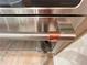 Stainless steel Cafe oven handle with copper accents, highlighting the modern kitchen design at 1021 Liberty Springs Dr, Woodstock, GA 30188
