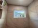 Shower with marble-look tiles and a window offering a view of the outdoors at 1021 Liberty Springs Dr, Woodstock, GA 30188