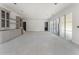 Open basement floor plan features built in cabinets, staircase, and neutral paint at 117 Owens Mill Pl, Canton, GA 30115