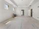 Unfinished bedroom featuring recessed lighting, a window, and doorways leading to other rooms at 117 Owens Mill Pl, Canton, GA 30115