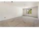 Unfinished bedroom featuring a dark-trimmed window and recessed lighting at 117 Owens Mill Pl, Canton, GA 30115