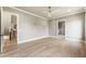 Spacious bedroom with hardwood floors, neutral walls, and ample natural light at 117 Owens Mill Pl, Canton, GA 30115