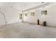 Unfinished bedroom featuring trim detail, multiple windows, and recessed lighting at 117 Owens Mill Pl, Canton, GA 30115