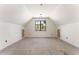 Bright bonus room featuring neutral paint, high ceilings, and convenient closet storage at 117 Owens Mill Pl, Canton, GA 30115