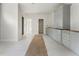 Unfinished kitchen with custom cabinets and plenty of storage space at 117 Owens Mill Pl, Canton, GA 30115