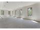 Living room with four large windows bringing in plenty of natural light at 117 Owens Mill Pl, Canton, GA 30115