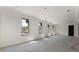Living room with five large windows bringing in plenty of natural light at 117 Owens Mill Pl, Canton, GA 30115