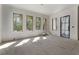 Bright living room features large windows, premium trim and new fixtures at 117 Owens Mill Pl, Canton, GA 30115